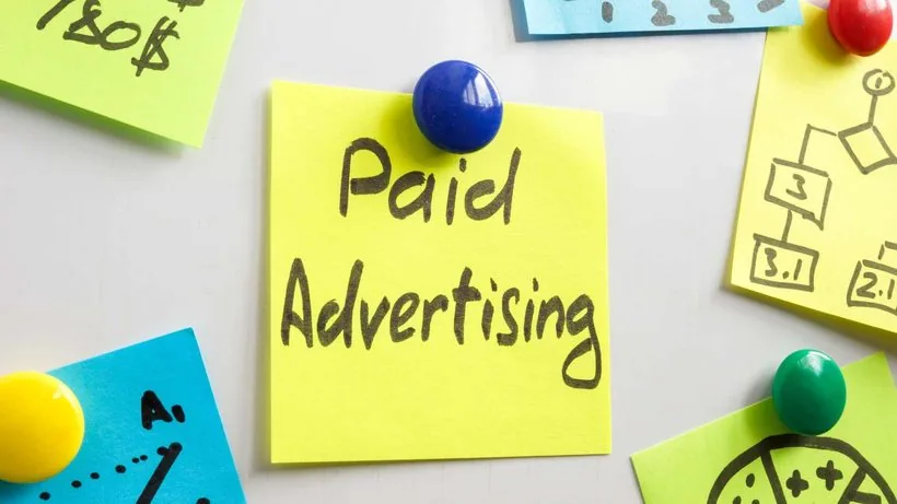 Paid advertising on a laptop and phone